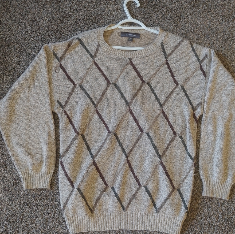 Sweater with front chest designs
